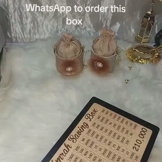 Islamic themed Umrah savings container with secure lock for holy journey fund Pakistan